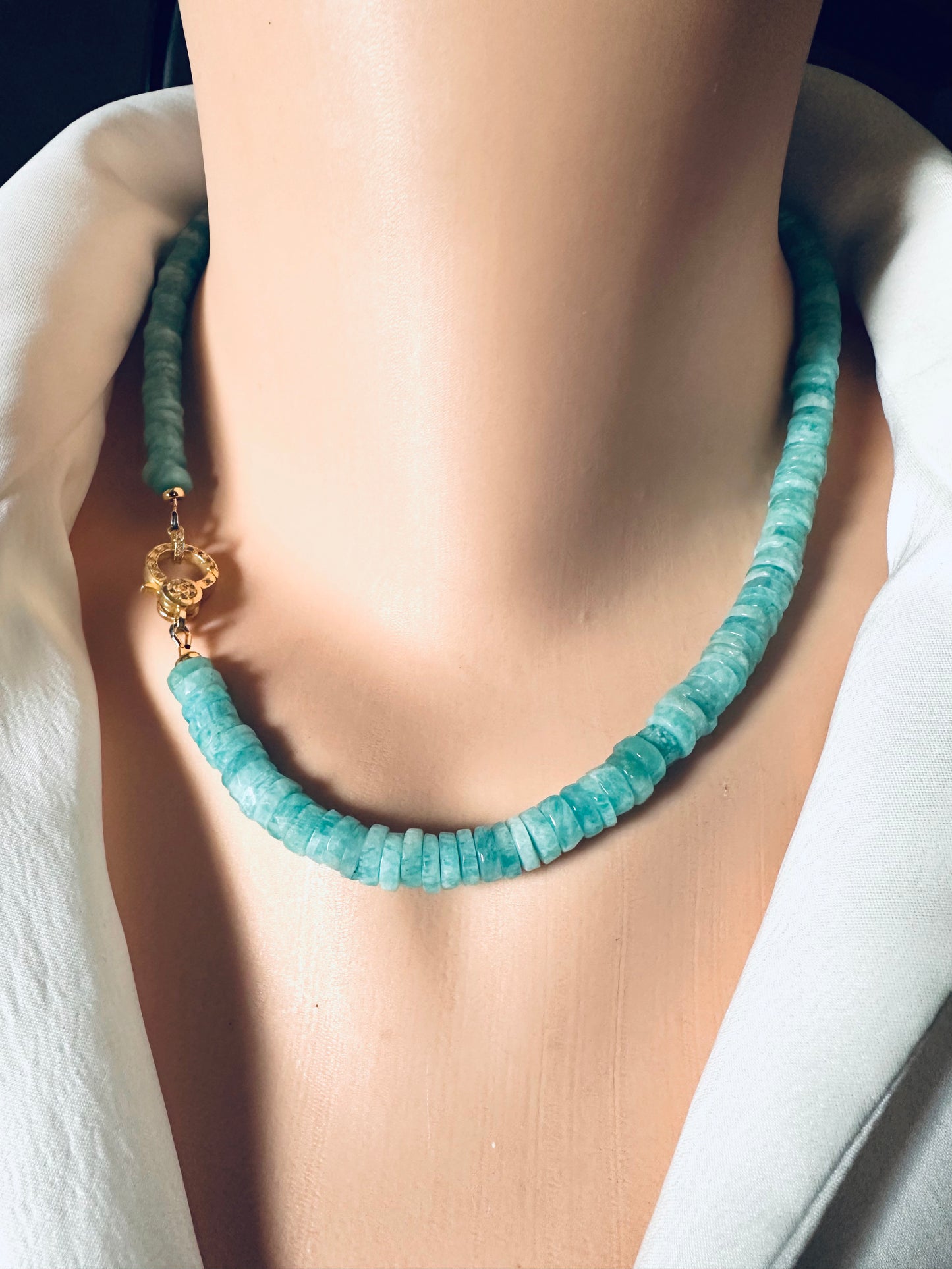 AMAZONITE beaded necklace with a gold clasp on a mannequin