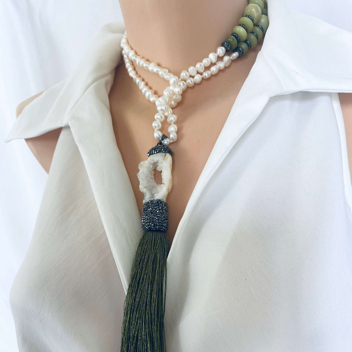 Boho Chic Pearl Tassel Necklace on mannequin — handcrafted pearl, jade, and druzy agate statement jewelry by Loulia Pearl Jewelry