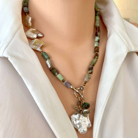 Chrysoprase necklace with dragonfly charm and baroque pearls displayed on a mannequin.