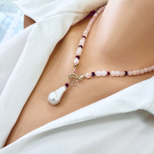Load image into Gallery viewer, beautiful gemstones toggle necklace combining Soft pink morganite beads with tiny red Ruby rondelles separated with gold filled beads and finished with baroque pearl pendant. 18"inches long