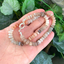 Load image into Gallery viewer, Hand-knotted candy choker necklace featuring 6mm faceted moonstone, labradorite, and sunstone beads, with a sterling silver marine clasp. The necklace measures 16 inches and offers a colorful and elegant design.