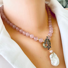 Load image into Gallery viewer, Smooth 8mm hand knotted rose quartz round bead necklace with a baroque pearl pendant, featuring an artisan gold bronze heart toggle clasp and gold-filled details. The necklace is 17.5 inches long and makes a thoughtful January birthstone gift