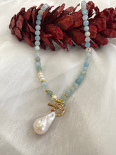 Load image into Gallery viewer, Shaded Blue Aquamarine Beads 6mm & Pearl Toggle Necklace featuring a stunning Baroque Pearl Pendant. Gold Vermeil Plated Silver Details. A perfect gift for March birthdays or any special occasion, measures 17.5-18 inches