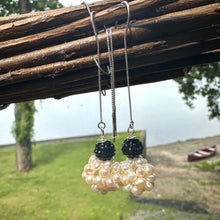 Load image into Gallery viewer, Freshwater pearl ball threader earrings featuring white ball pearls with black rhinestone pave polymer clay accents on top. The earrings are silver, long, and elegant, with a minimalist design that threads through the ear for a modern look