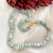 Load image into Gallery viewer, Hand-knotted candy necklace featuring faceted aquamarine rondelle beads with a gold vermeil plated silver marine closure. Available in 18.5 or 21.5 inches, this elegant piece is a perfect March birthstone gift for her.