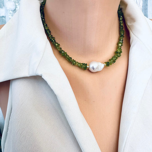 Baroque pearl peridot necklace worn at collarbone with natural peridot and freshwater pearl