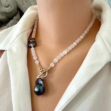 Load image into Gallery viewer, White moonstone bead necklace with 6mm beads, featuring a side black peacock pearl and a baroque pearl pendant, accented with a gold bronze artisan toggle and gold-filled details. This 18-inch necklace is an elegant June birthstone gift for her.