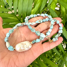 Carica l'immagine nel visualizzatore di Gallery, Fall in love with the soothing blues of Larimar and the timeless elegance of baroque pearls! This necklace features dreamy, ocean-inspired Larimar gemstones nuggets, perfectly complemented by the organic beauty of a stunning baroque pearl, 18 inches