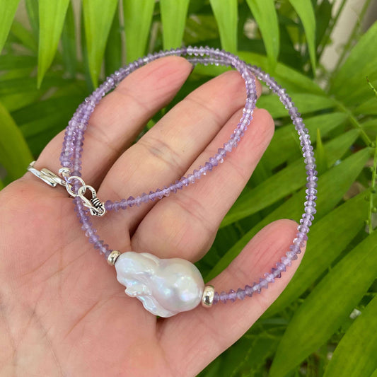 Lavender amethyst baroque pearl necklace featuring a white Baroque pearl and Amethyst beads, perfect for elegant style.