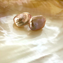 Load image into Gallery viewer, Golden pink rectangle baroque pearl stud earrings detailed view on pearl backdrop, elegant handmade jewelry from Canada.