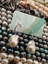 Carica l'immagine nel visualizzatore di Gallery, White Baroque Pearl Earrings – silver set displayed with colorful gemstones background