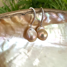 Load image into Gallery viewer, Golden pink baroque pearl dangle earrings hanging from white pearl shell, elegant handcrafted jewelry from Canada.