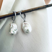 Carica l'immagine nel visualizzatore di Gallery, White Baroque Pearl Earrings – silver close-up against white cloth backdrop.