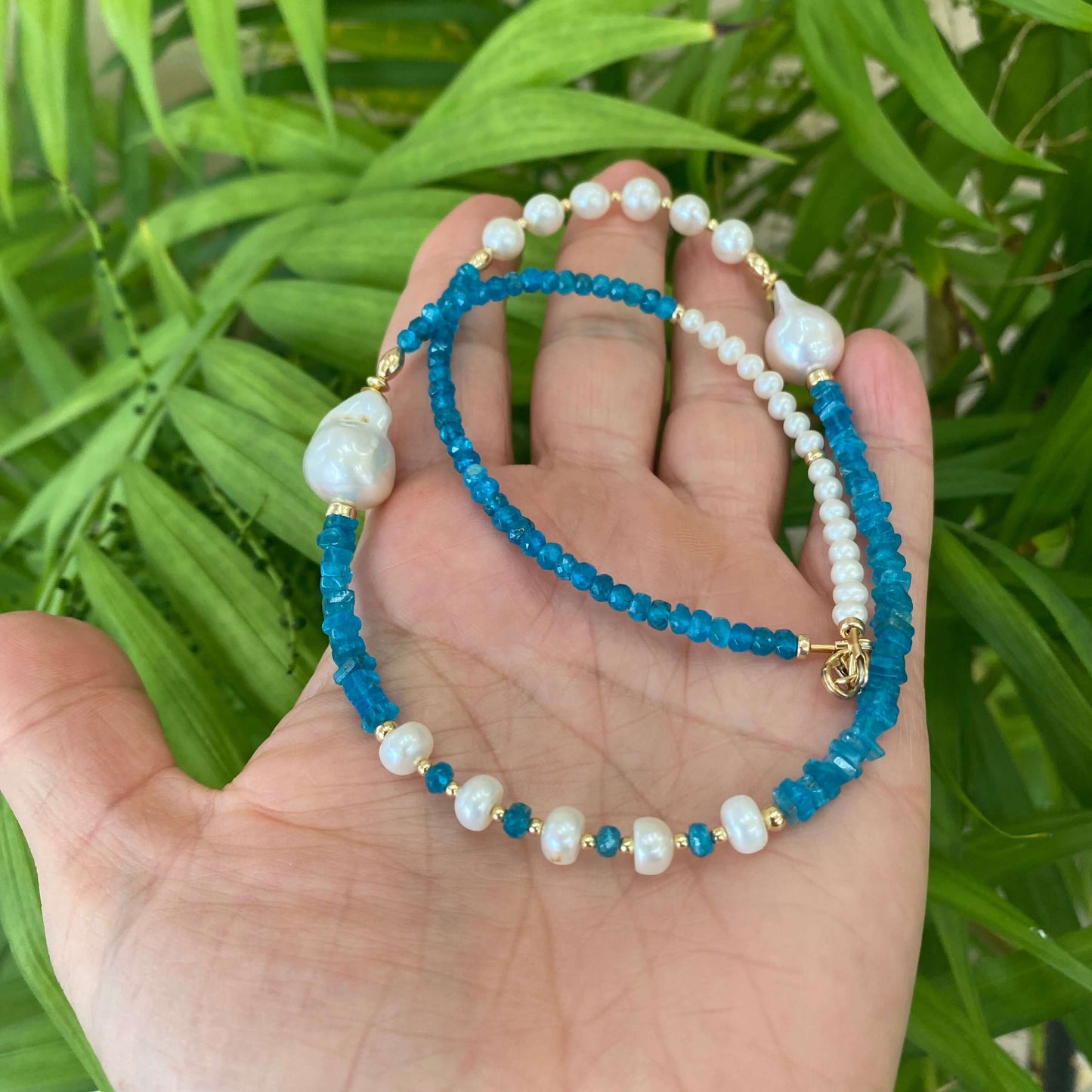 Blue Apatite Baroque Pearl Necklace | Asymmetric 14K Gold Filled showcasing vivid gemstones and pearls in hand.