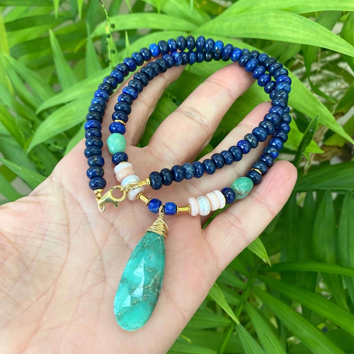 Lapis lazuli chrysoprase pink opal necklace highlighting chrysoprase pendant and bead details