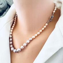 Load image into Gallery viewer, Pastel Rice Pearl Necklace featuring sterling silver tulip clasp shown in close-up on mannequin.
