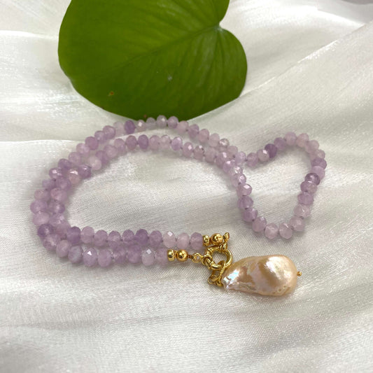 Lavender amethyst baroque pearl necklace featuring light-purple amethyst beads and a luminous Baroque pearl pendant.