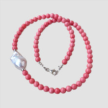 Carica l'immagine nel visualizzatore di Gallery, Pink coral and one large baroque pearl on the side of the necklace with sterling silver details, measuring 18.5 inches. This vibrant summer jewelry piece is perfect for beach outings and makes a thoughtful gift for her.