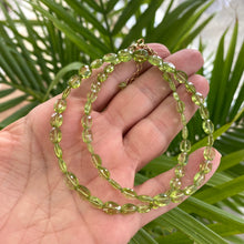 Load image into Gallery viewer, Faceted Peridot Beads Choker Necklace, beads are oval shaped and slightly graduated, light Olive Green Peridot Jewelry, Gold Filled closure and details, 17"inches long, August Birthstone, best Birthday Gift For Her, Minimalist Jewelry