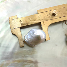 Load image into Gallery viewer, Baroque pearl drops measured against ruler without gold flower studs