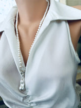 Load image into Gallery viewer, Side view of white pearl necklace with baroque pendant on mannequin display