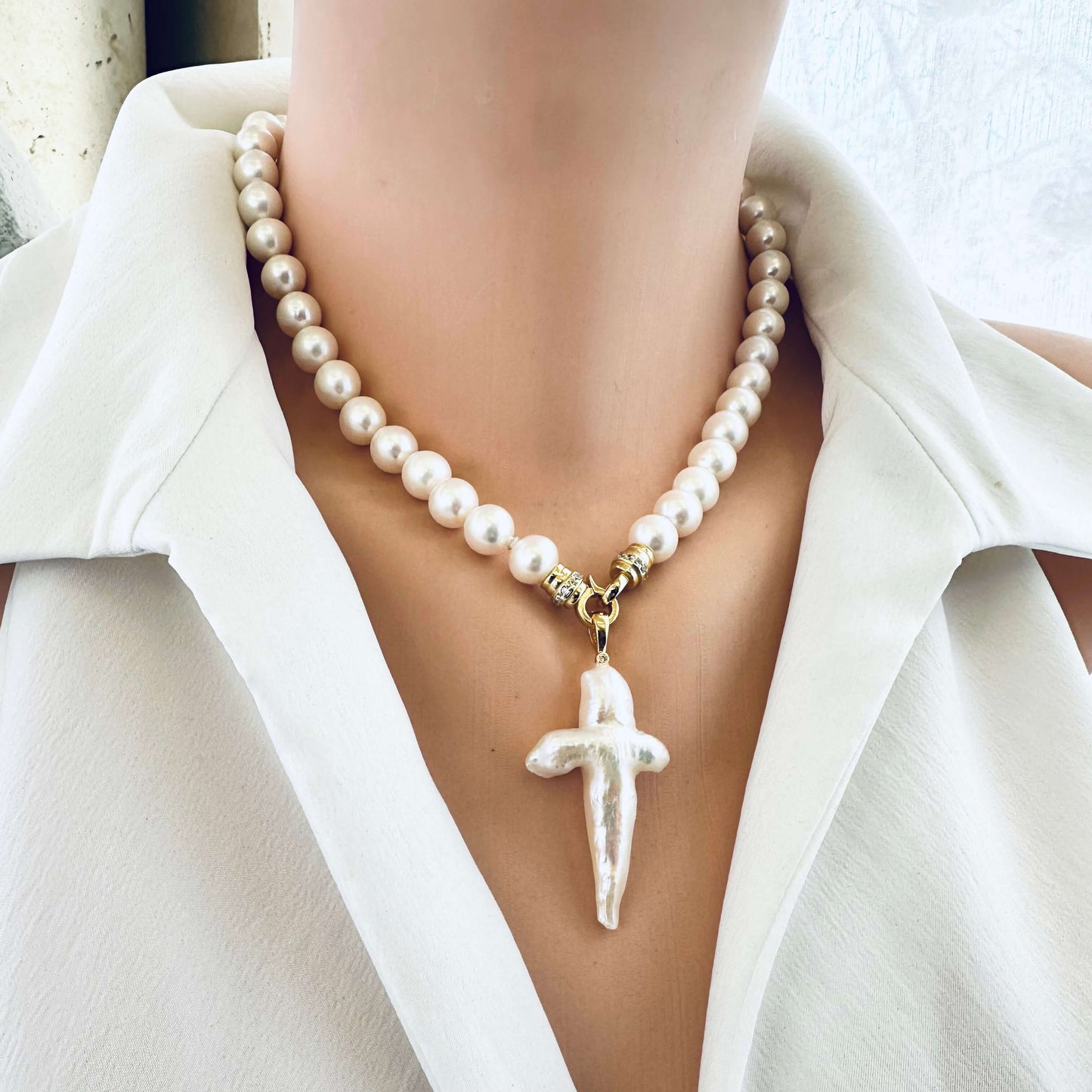 Short white pearl necklace with baroque pearl cross pendant, handcrafted in Canada.