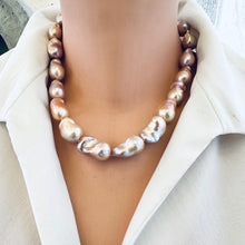 Load image into Gallery viewer, Golden pink baroque pearl necklace on mannequin, front view showing elegant clasp