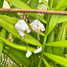 Load image into Gallery viewer, Boho pearl earrings gold filled displayed outdoors with leafy green backdrop — keshi square pearls and blue gemstones by Loulia Pearl Jewelry
