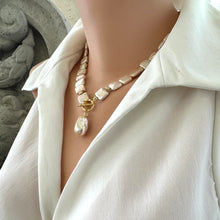 Load image into Gallery viewer, Golden baroque pearl toggle necklace on mannequin side view — handcrafted luminous pearl jewelry by Loulia Pearl Jewelry