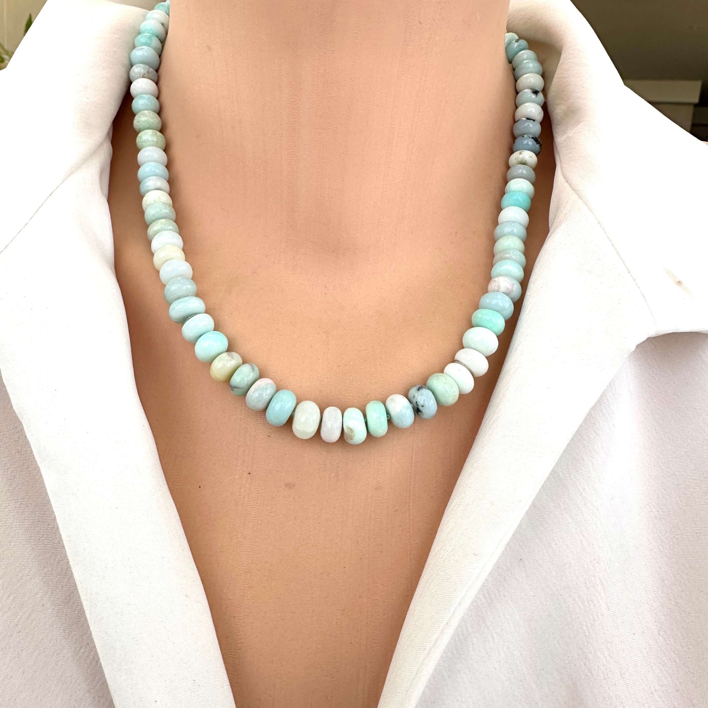 Blue Peru Opal Necklace Gold close-up at neckline, natural blue Peru opal bead strand