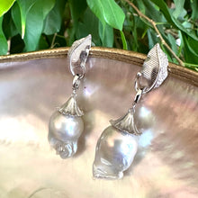 Load image into Gallery viewer, Leaf Design Baroque Pearl Earrings photographed against green leaf background — botanical sterling silver jewelry by Loulia Pearl Jewelry