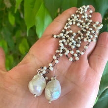 Load image into Gallery viewer, Versatile 40-inch Pearl Lariat Rosary Chain, designed with a stunning black rhodium-plated silver chain and freshwater small pearls for a modern, sophisticated look. Each end of the lariat features a unique white baroque pearl