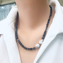 Carica l'immagine nel visualizzatore di Gallery, Navy Blue Iolite Rectangular Beads and 2 Baroque Pearls off centre Necklace. Finished with sterling silver details, this necklace brings together luxury and durability. The adjustable length, ranging from 19 to 20 inches, ensures a perfect fit