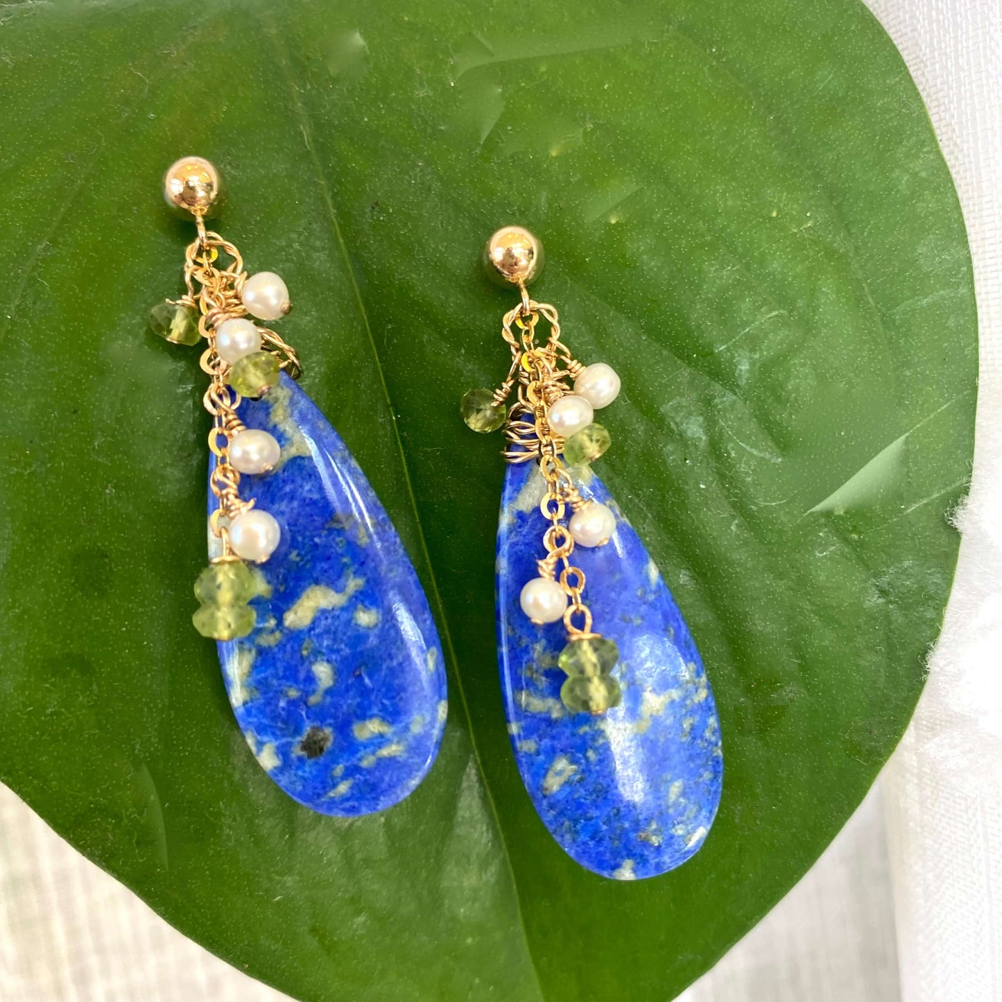 Lapis Lazuli Peridot Earrings – Teardrop 14k Gold Filled showcasing unique blue lapis lazuli and peridot gemstones.