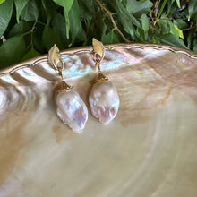 Load image into Gallery viewer, Leaf Design Pearl Earrings featuring gold vermeil leaf accents and genuine baroque pearl drops on a shell background.