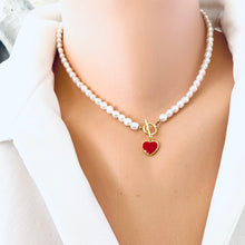 Load image into Gallery viewer, White Pearl Necklace with red heart charm displayed in frontal close-up on mannequin.