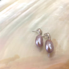 Load image into Gallery viewer, Heart Pearl Earrings – detailed silver pair displayed on white shell background