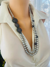 Load image into Gallery viewer, Elegant double-strand Grey Pearl Necklace with gunmetal CZ accents displayed on mannequin side angle.