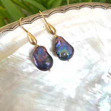 Load image into Gallery viewer, Close-up of baroque pearl drop earrings highlighting peacock tones and gold vermeil details