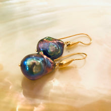 Load image into Gallery viewer, Handmade black baroque pearl drop earrings with gold vermeil hooks displayed on white pearl backdrop