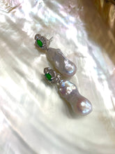 Load image into Gallery viewer, Detailed view of green diopside baroque pearl drop earrings — close-up of gemstone studs and pearls on white pearl shell background