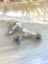 Load image into Gallery viewer, Sapphire version of emerald stud earrings with pearl drops on white pearl shell