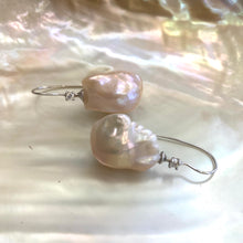 Load image into Gallery viewer, Golden Baroque Pearl Earrings – close-up against white pearl shell backdrop