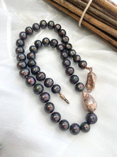 Load image into Gallery viewer, Full view of black pearl necklace with rose gold pendant on white background