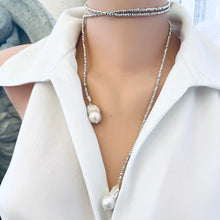 Load image into Gallery viewer, Silver pyrite baroque pearl necklace displayed on a mannequin, featuring a long lariat wrap design with large baroque pearls.