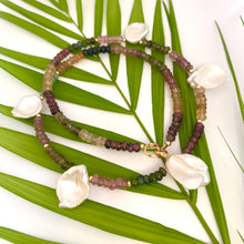 Load image into Gallery viewer, Handcrafted multi tourmaline and keshi pearl necklace against leaf and white background, artisan jewelry.