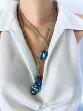 Load image into Gallery viewer, Green Prehnite and Black Baroque Pearls Lariat Necklace displayed on mannequin, showcasing elegant design and handcrafted details.