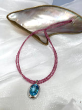 Load image into Gallery viewer, Pink Tourmaline Blue Topaz Pendant on double-strand necklace, showcasing vibrant pink and blue gemstones.