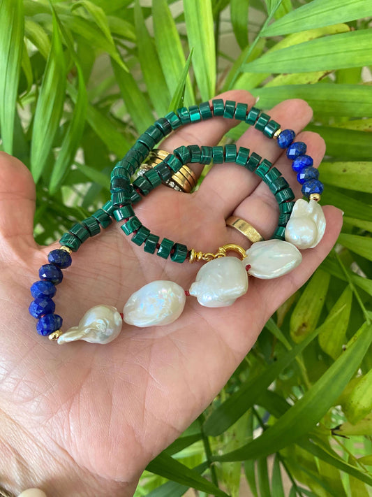 Malachite Lapis Lazuli Baroque Pearl Necklace shown outdoors with natural leaf background, handcrafted in Canada.