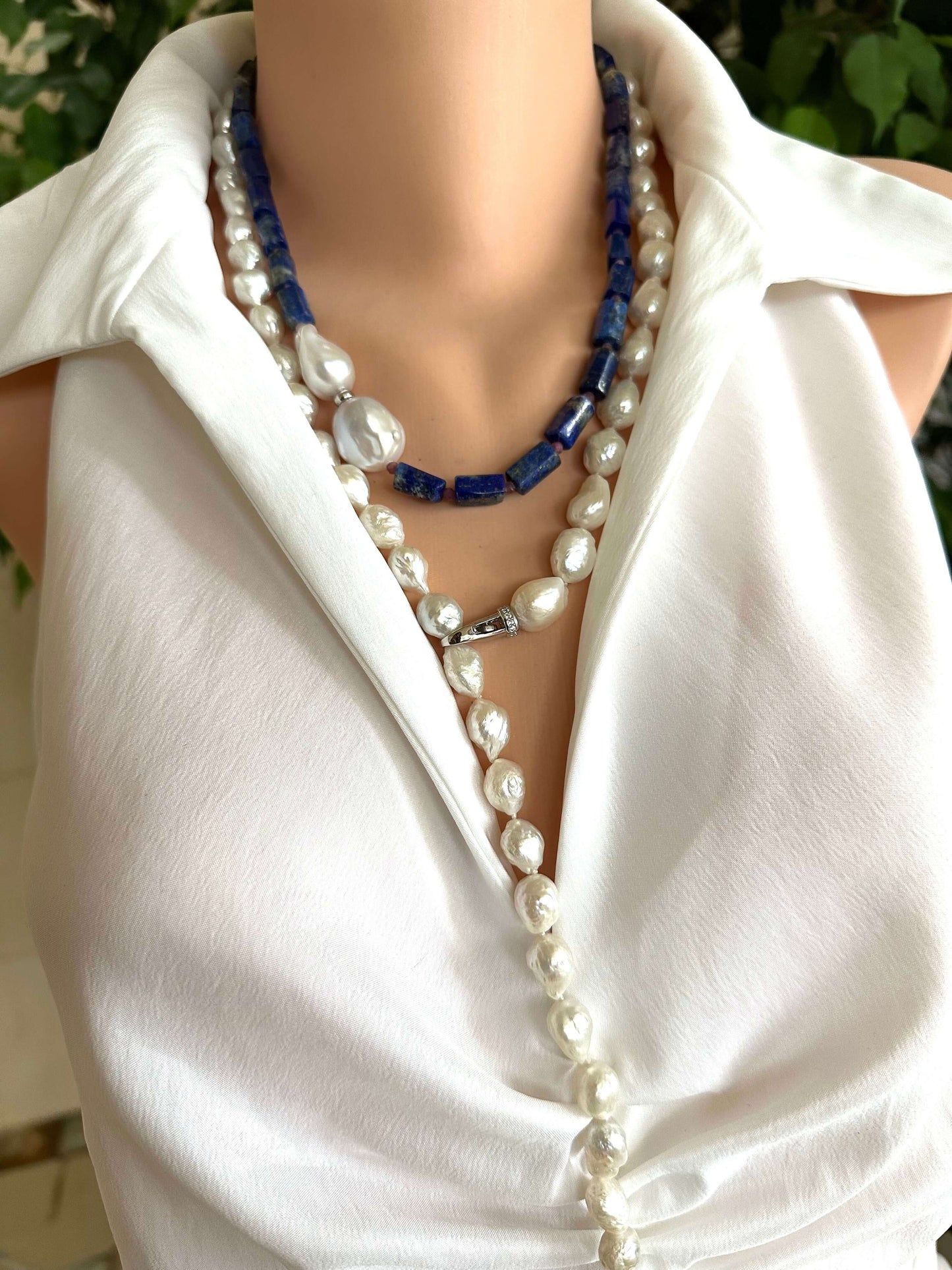Edison baroque pearl Y necklace displayed on a mannequin, showcasing its unique pearls and elegant design.